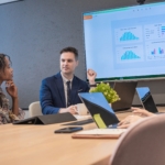 A Man & Woman Discussing About Data-Driven Intelligence for Full-Funnel Marketing